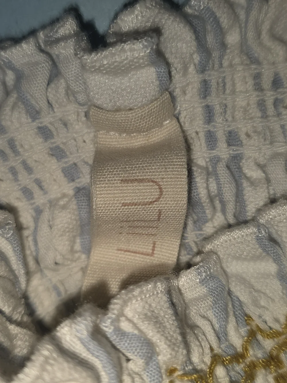 LIILU Striped Smocked Baby One-Piece Romper in White and Light Blue 6 Months